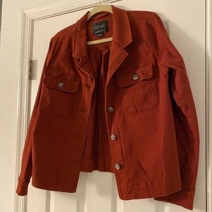 Burnt orange/ reddish orange jacket